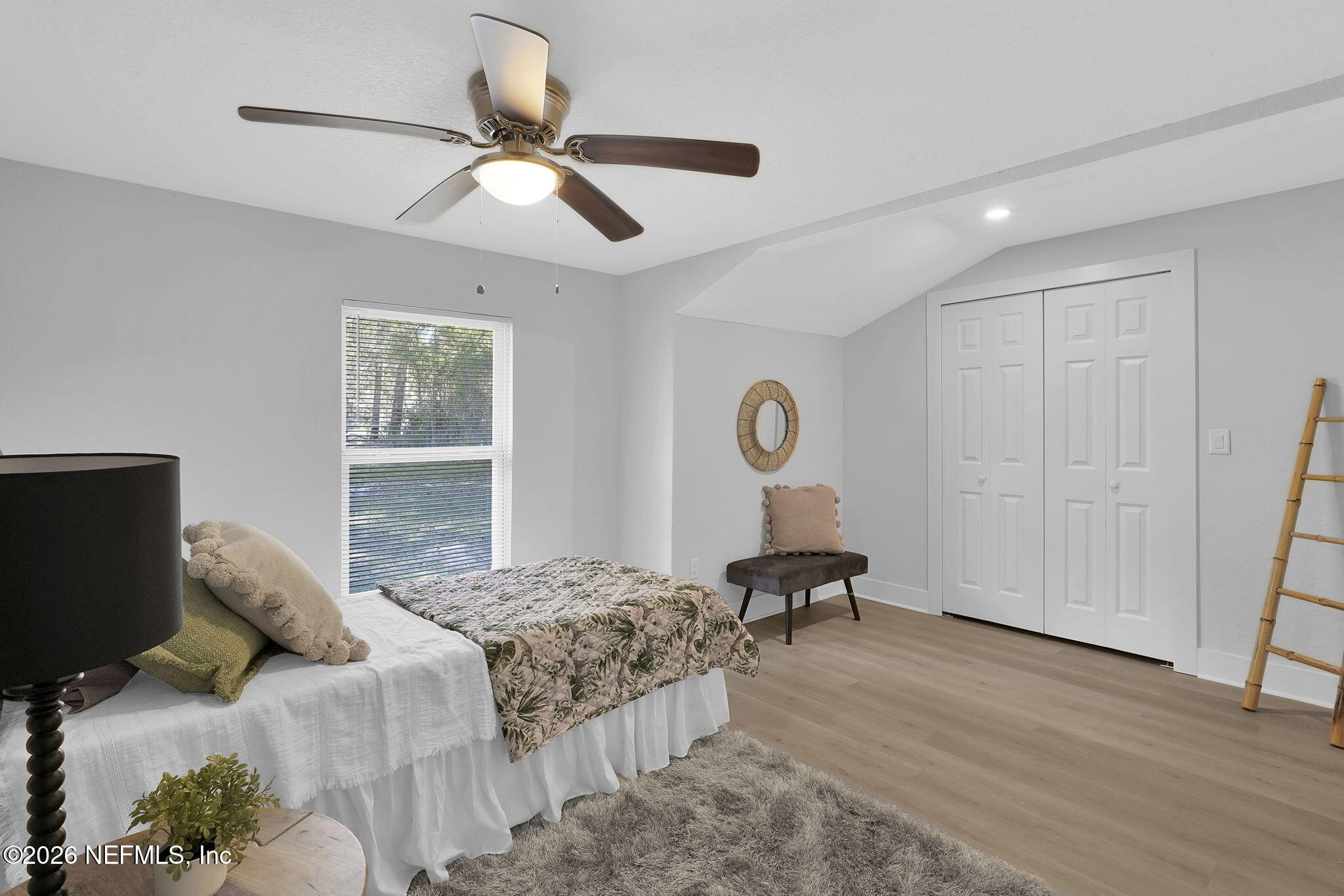 3946 Murrhee Road Green Cove Springs, FL 32043 - Photo 22 of 35 a bedroom with a bed and a window
