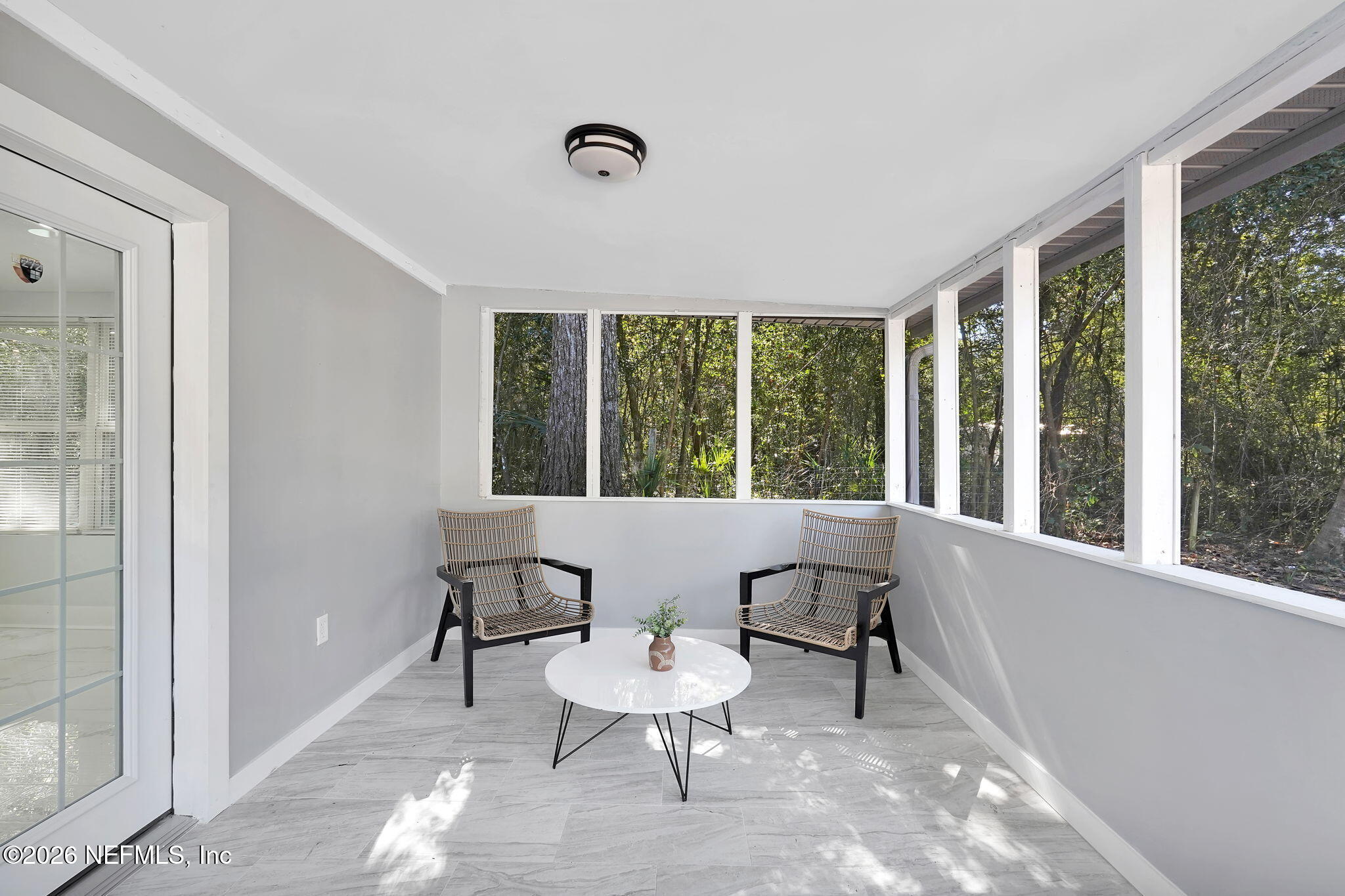 3946 Murrhee Road Green Cove Springs, FL 32043 - Photo 30 of 35 a view of a room with a chairs and table in a room