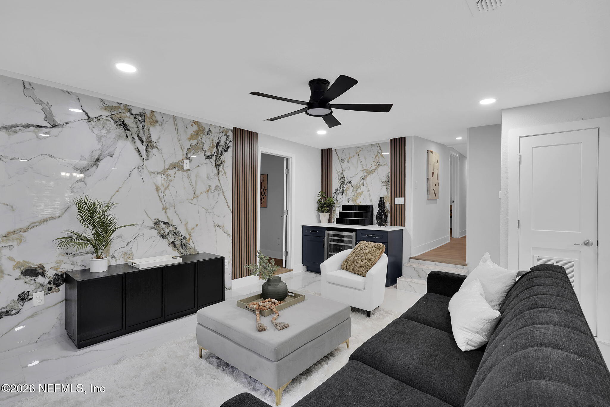 3946 Murrhee Road Green Cove Springs, FL 32043 - Photo 7 of 35 a living room with furniture and kitchen view