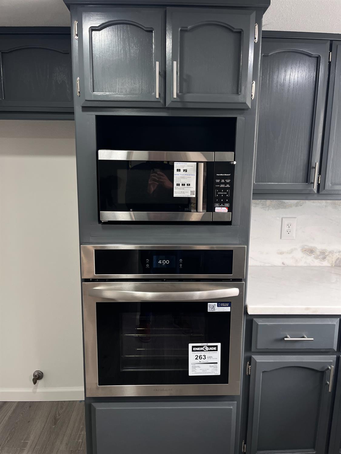 929 Barnett Way Madera, CA 93637 - Photo 12 of 23 a stove top oven sitting inside of a kitchen
