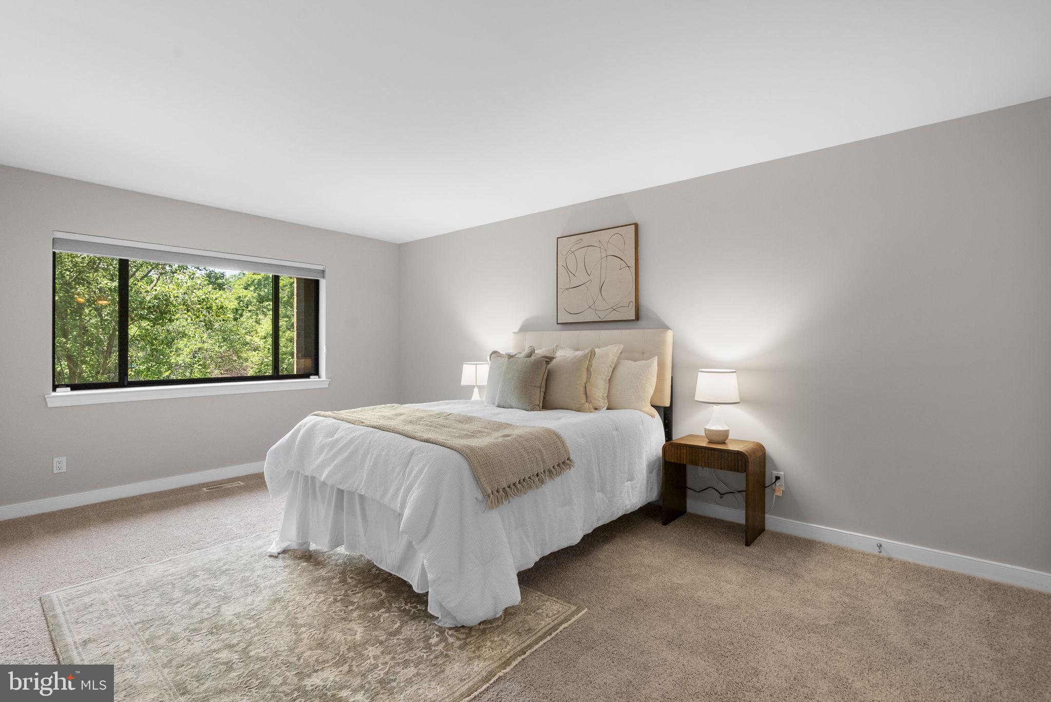 11420 Strand Drive, Unit R010 Rockville, MD 20852 - Photo 21 of 56 Primary Bedroom Suite
