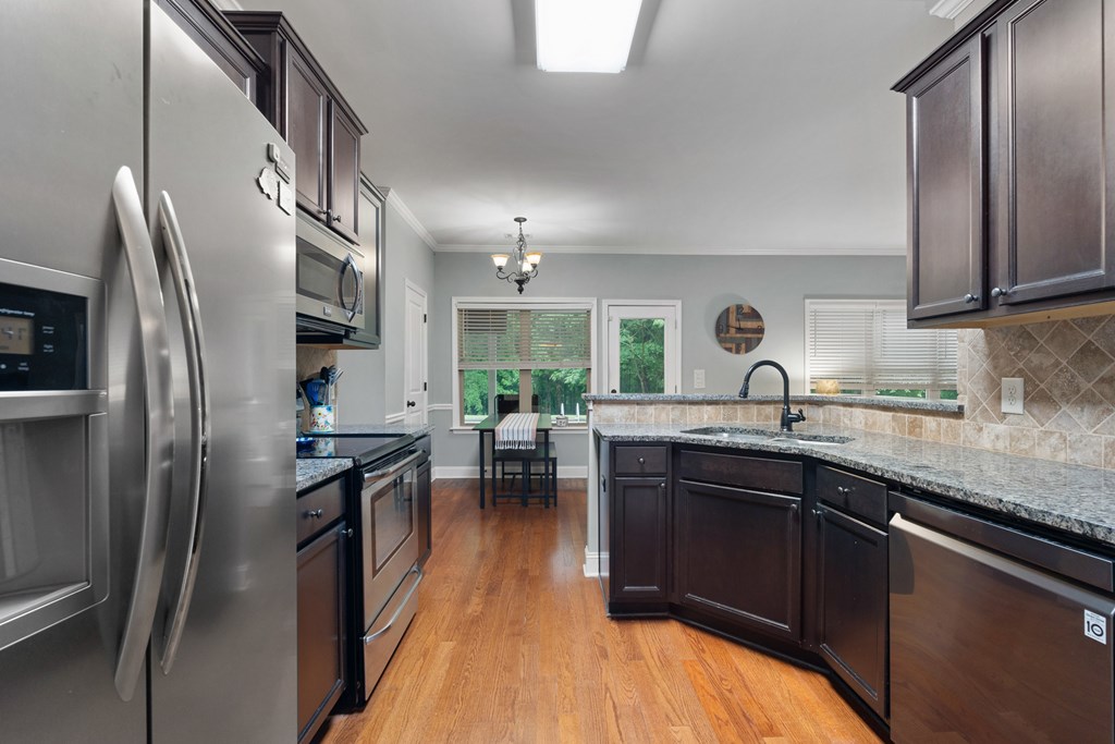 4337 Almond Road Fortson, GA 31808 - Photo 14 of 32 Granite Countertops and Stainless Steel Appliances