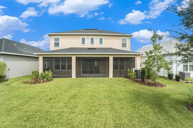 a view of a large garden with an outdoor space