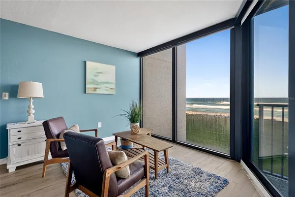a workspace with furniture and window