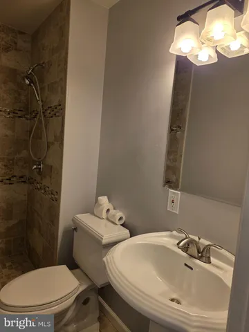 a view of staircase with wooden floor