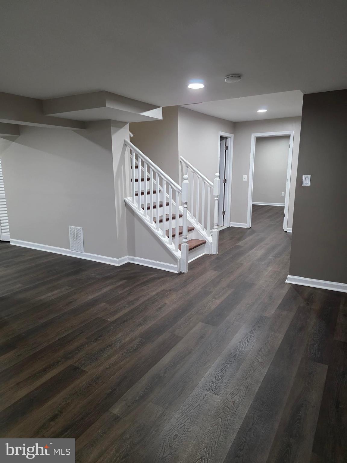 3002 Ivy Bridge Road Fort Washington, MD 20744 - Photo 30 of 65 a view of an empty room with wooden floor