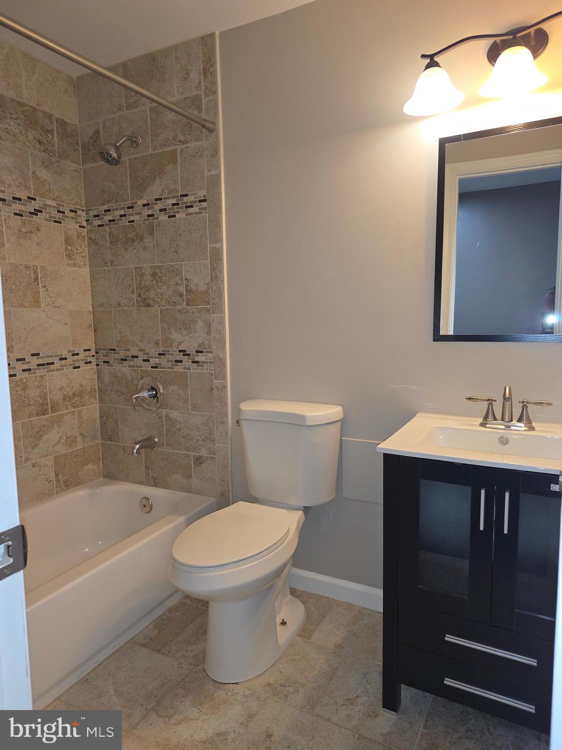 3002 Ivy Bridge Road Fort Washington, MD 20744 - Photo 34 of 65 a bathroom with a sink toilet and shower