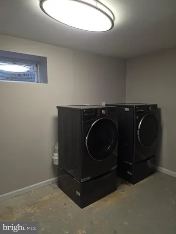 a bathroom with a shower and toilet