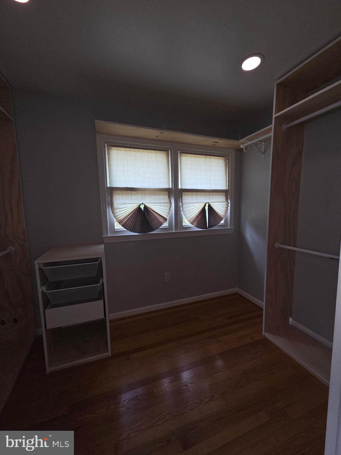 3002 Ivy Bridge Road Fort Washington, MD 20744 - Photo 54 of 65 a view of an empty room with wooden floor and a window