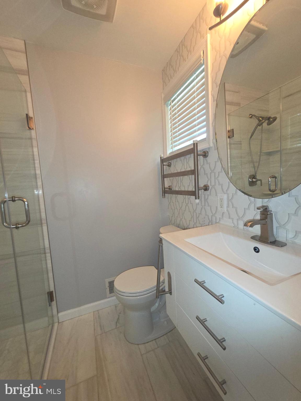 3002 Ivy Bridge Road Fort Washington, MD 20744 - Photo 54 of 71 a bathroom with a sink and a mirror