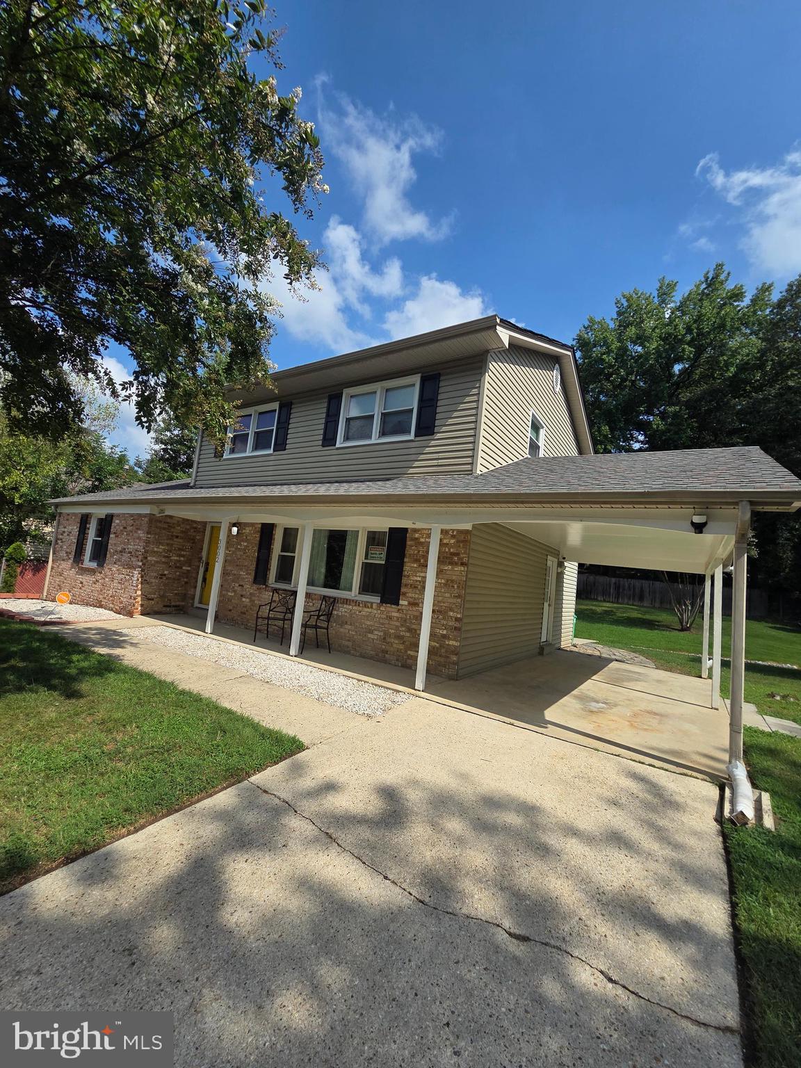 3002 Ivy Bridge Road Fort Washington, MD 20744 - Photo 61 of 71 a front view of a house with a garden