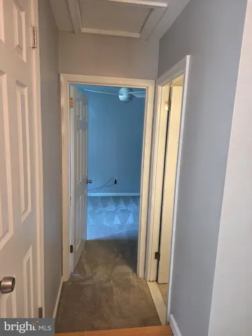 a kitchen with granite countertop a stove a sink and a microwave