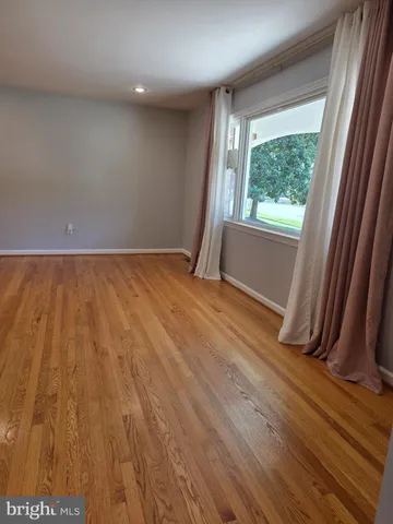 a kitchen with granite countertop a stove and a sink