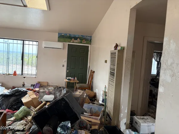 a room with furniture and a window