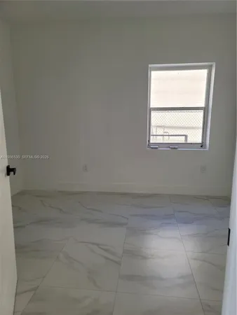 a bathroom with a window