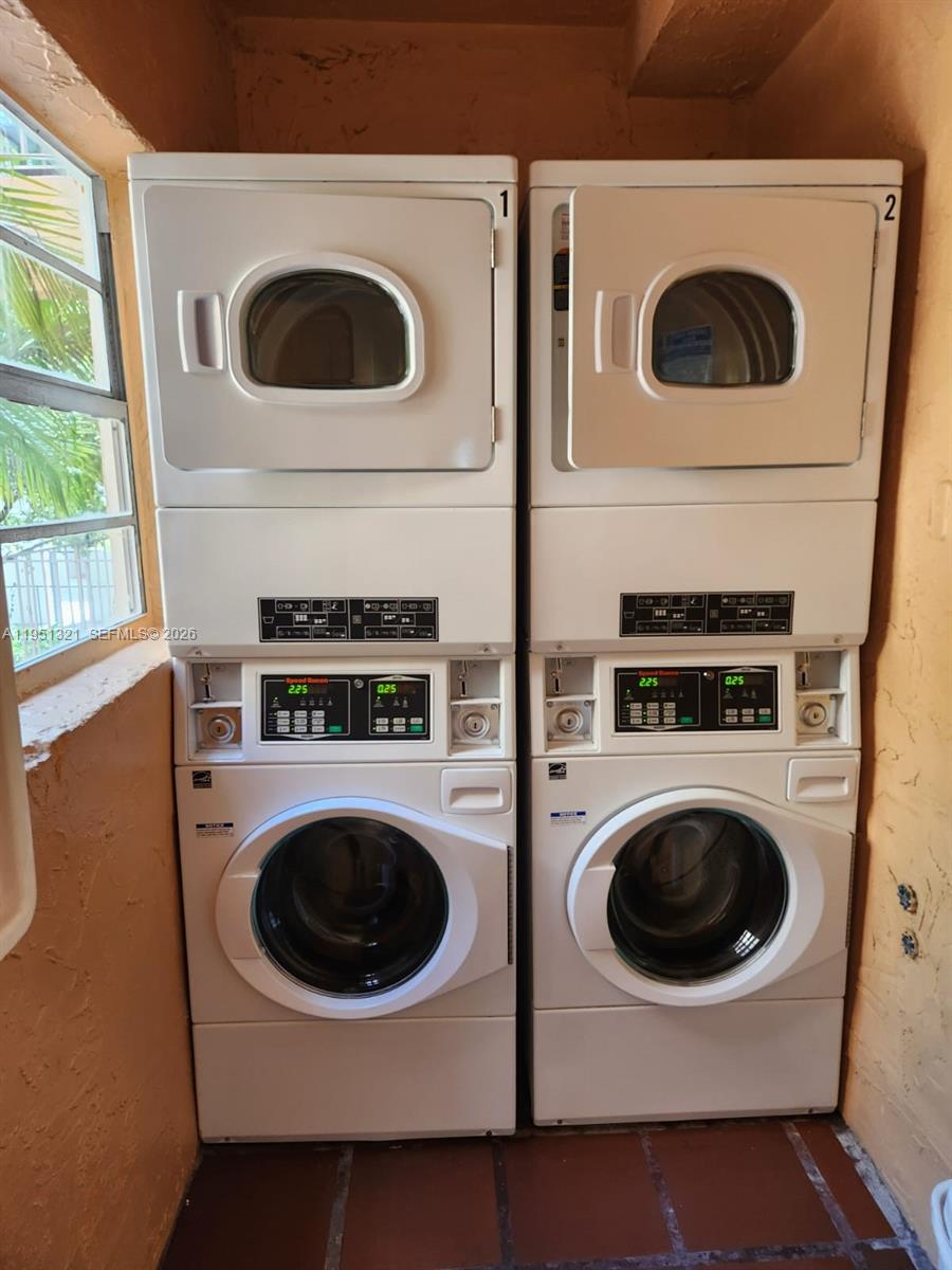 8101 Southwest 73rd Avenue, Unit 6 Miami, FL 33143 - Photo 8 of 18 a utility room with dryer and washer