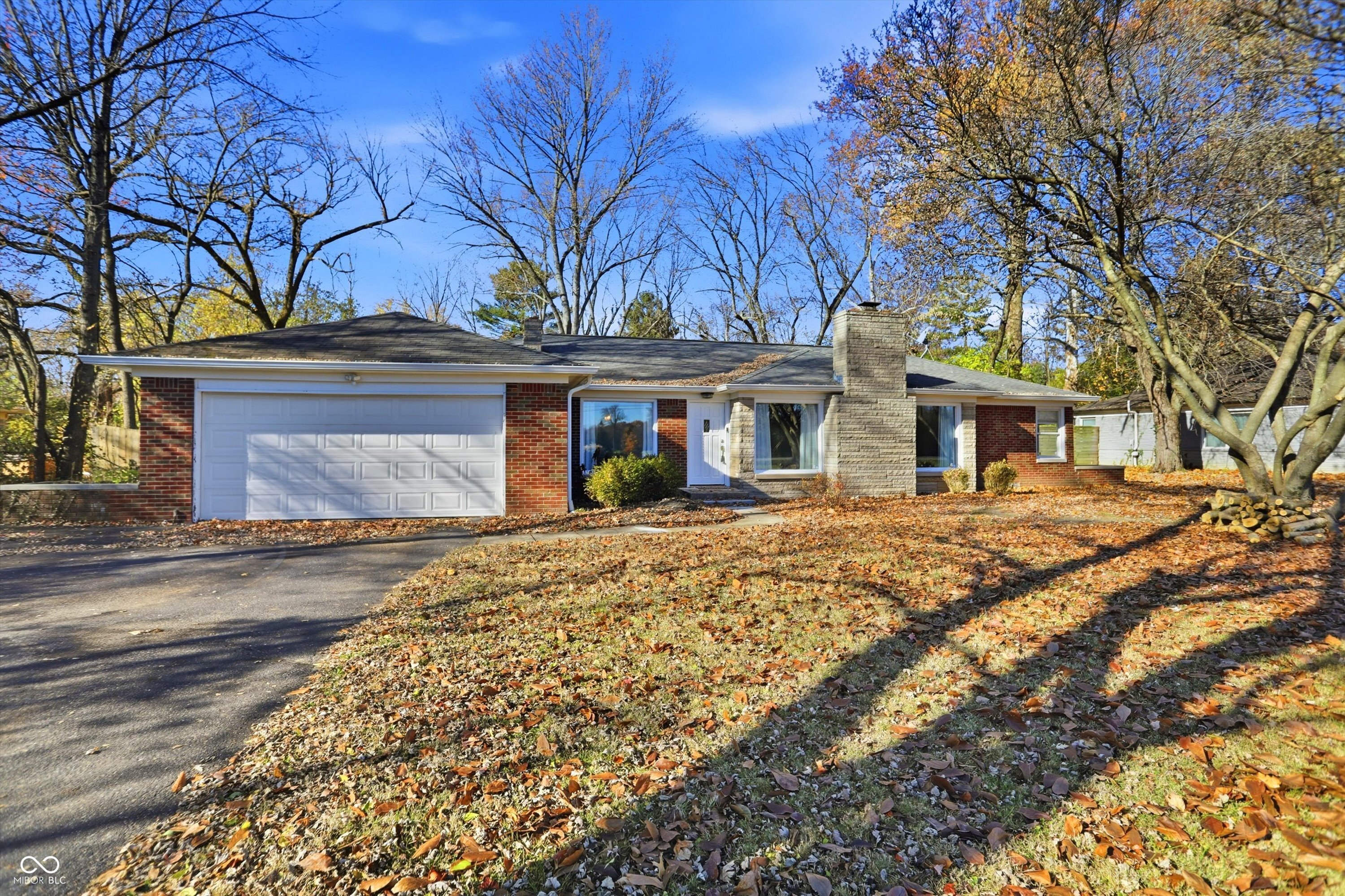 7026 Spring Mill Road Indianapolis, IN 46260 - Photo 2 of 48