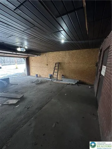 a view of storage and utility room