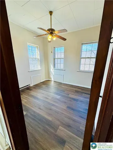 a kitchen with stainless steel appliances granite countertop a sink and a stove top oven