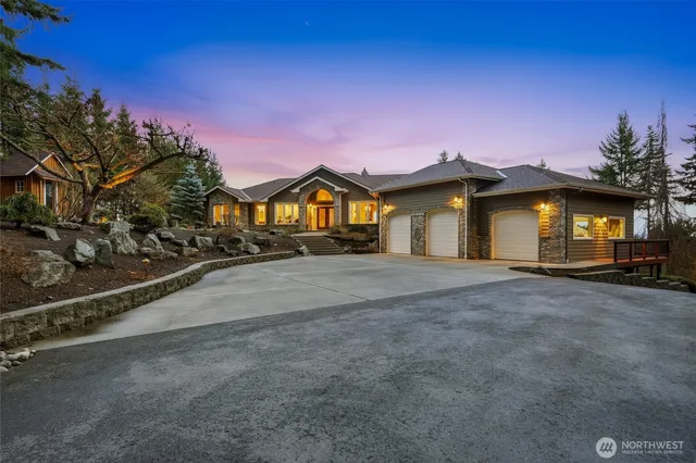 a view of a house with a street