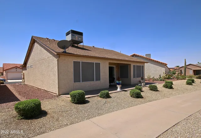 a front view of a house with patio