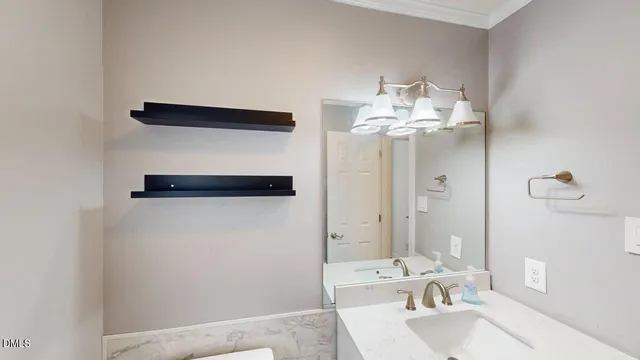 a living room with furniture pool table wooden floor and windows