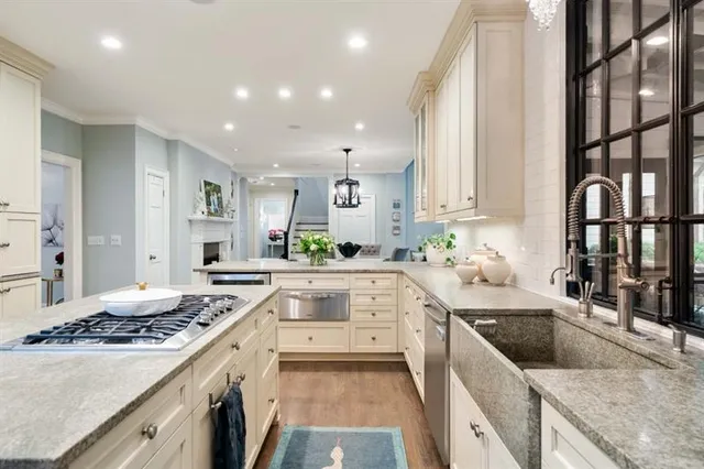 a view of a livingroom with furniture window and wooden floor