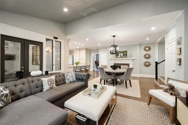 a bathroom with a sink a mirror and a shower