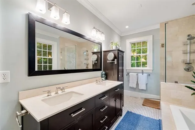 a living room with furniture a window and a flat screen tv
