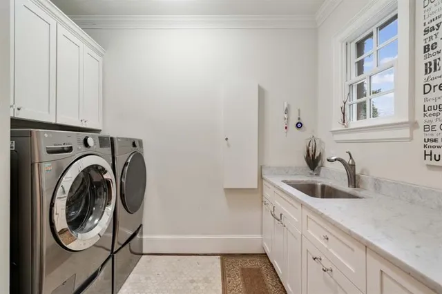 a view of a work space with hardwood floor and a window