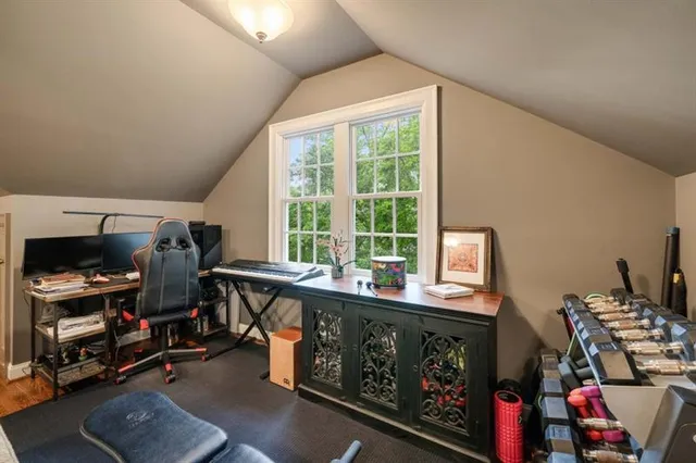 a room with furniture and a wooden floor