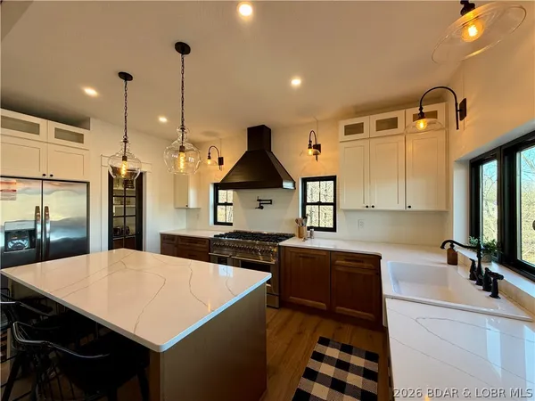 $900,000 | 139 Jumping Bass Cove Road, Roach, MO 65787