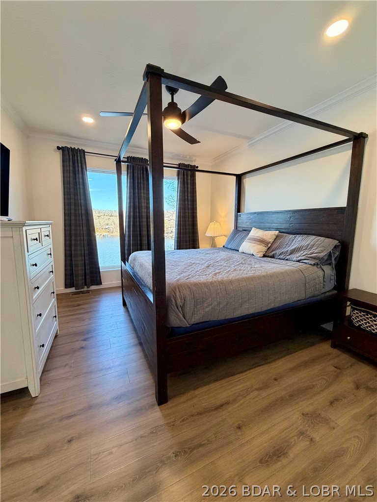 139 Jumping Bass Cove Road Roach, MO 65787 - Photo 26 of 57 Primary Ensuite Lake Side main level