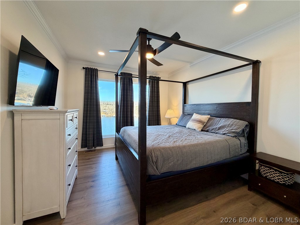 139 Jumping Bass Cove Road Roach, MO 65787 - Photo 29 of 57 Primary with ensuite main level lake side