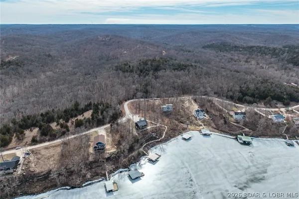 $900,000 | 139 Jumping Bass Cove Road, Roach, MO 65787