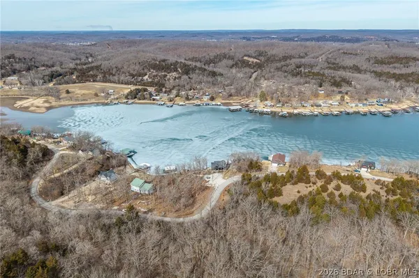 $900,000 | 139 Jumping Bass Cove Road, Roach, MO 65787