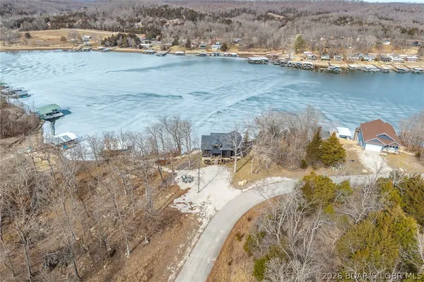 $900,000 | 139 Jumping Bass Cove Road, Roach, MO 65787