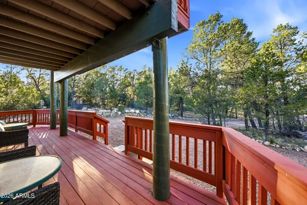 a view of a two chairs in the patio