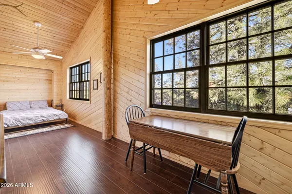 a bed sitting in front of a house