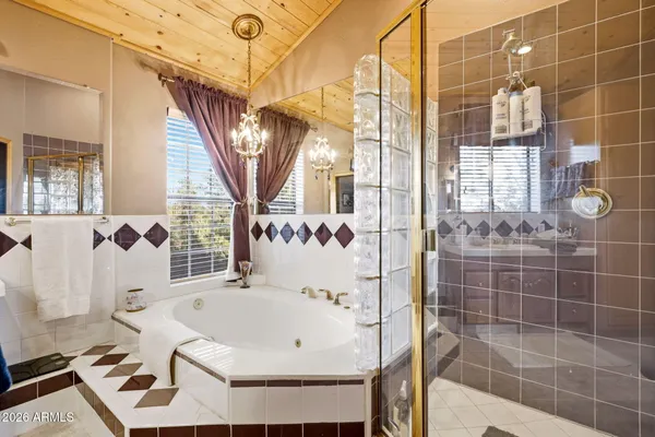 a view of a room with furniture and wooden floor