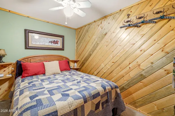 a bath room with a sink furniture and a window