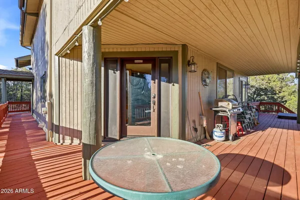 a bathroom with a toilet a sink and a mirror