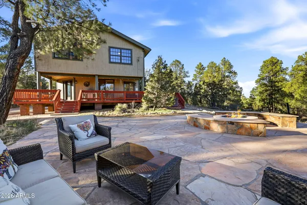 a outdoor space with lots of white furniture