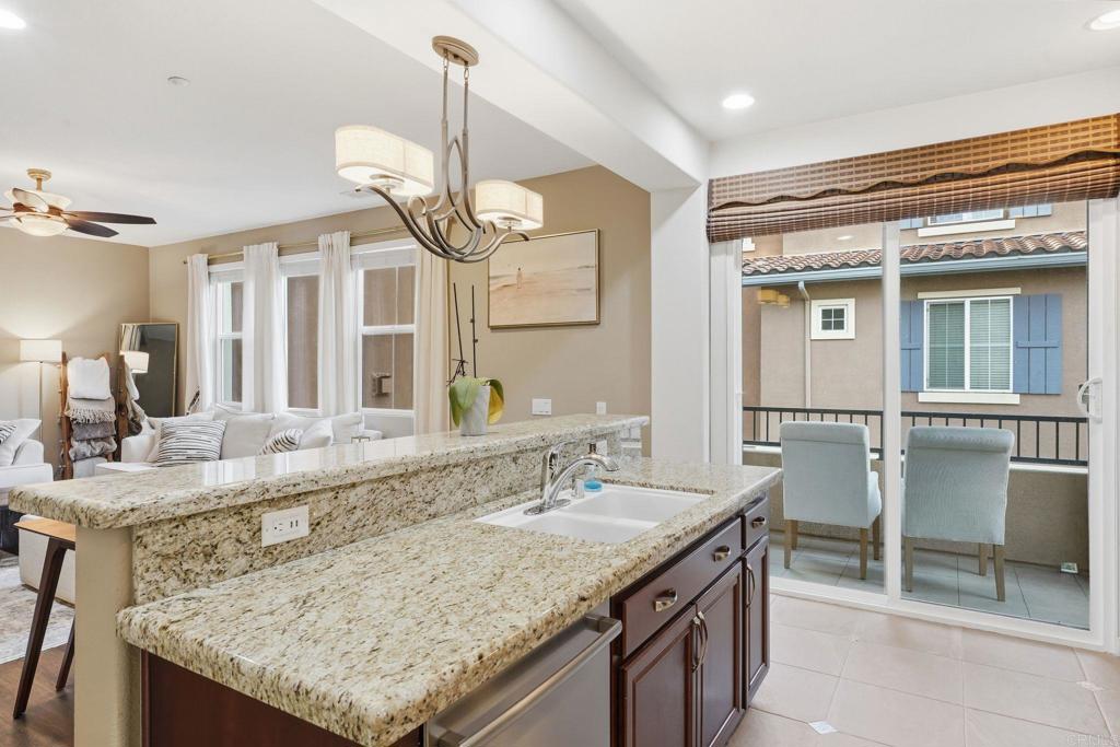 60 Via Sovana Santee, CA 92071 - Photo 11 of 26 a bathroom with a granite countertop sink and a mirror