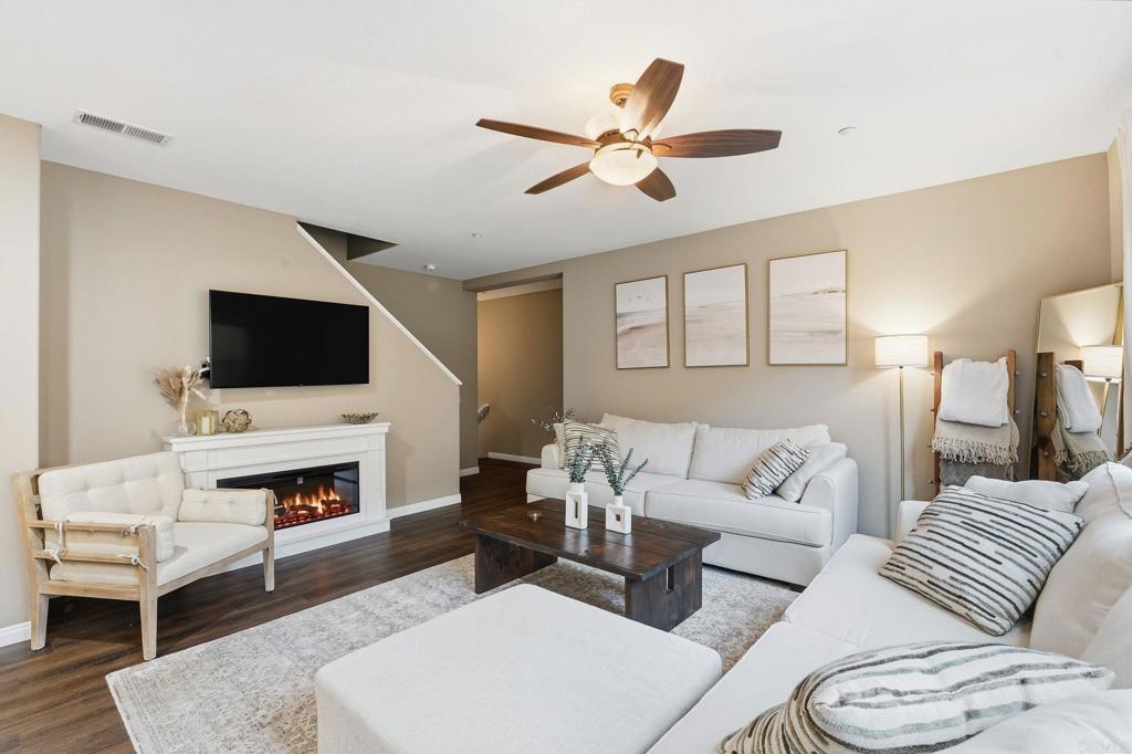 60 Via Sovana Santee, CA 92071 - Photo 2 of 26 a living room with furniture and a flat screen tv