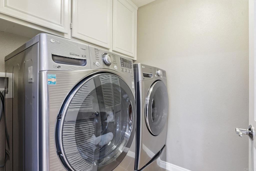 60 Via Sovana Santee, CA 92071 - Photo 21 of 26 a utility room with dryer and washer