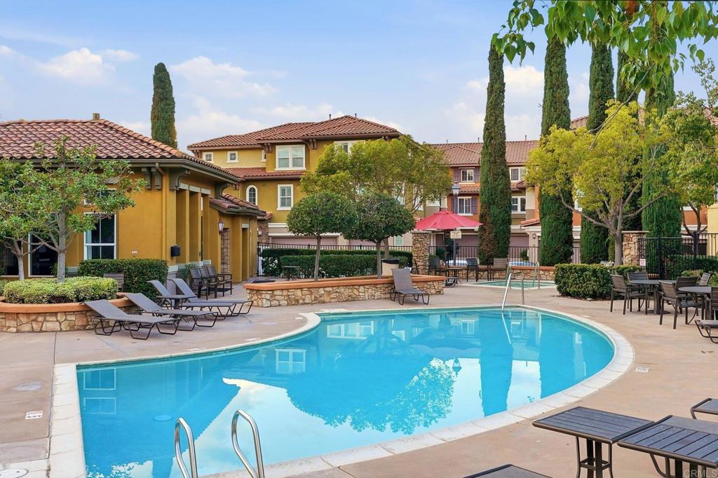 60 Via Sovana Santee, CA 92071 - Photo 25 of 26 a view of a swimming pool with chairs
