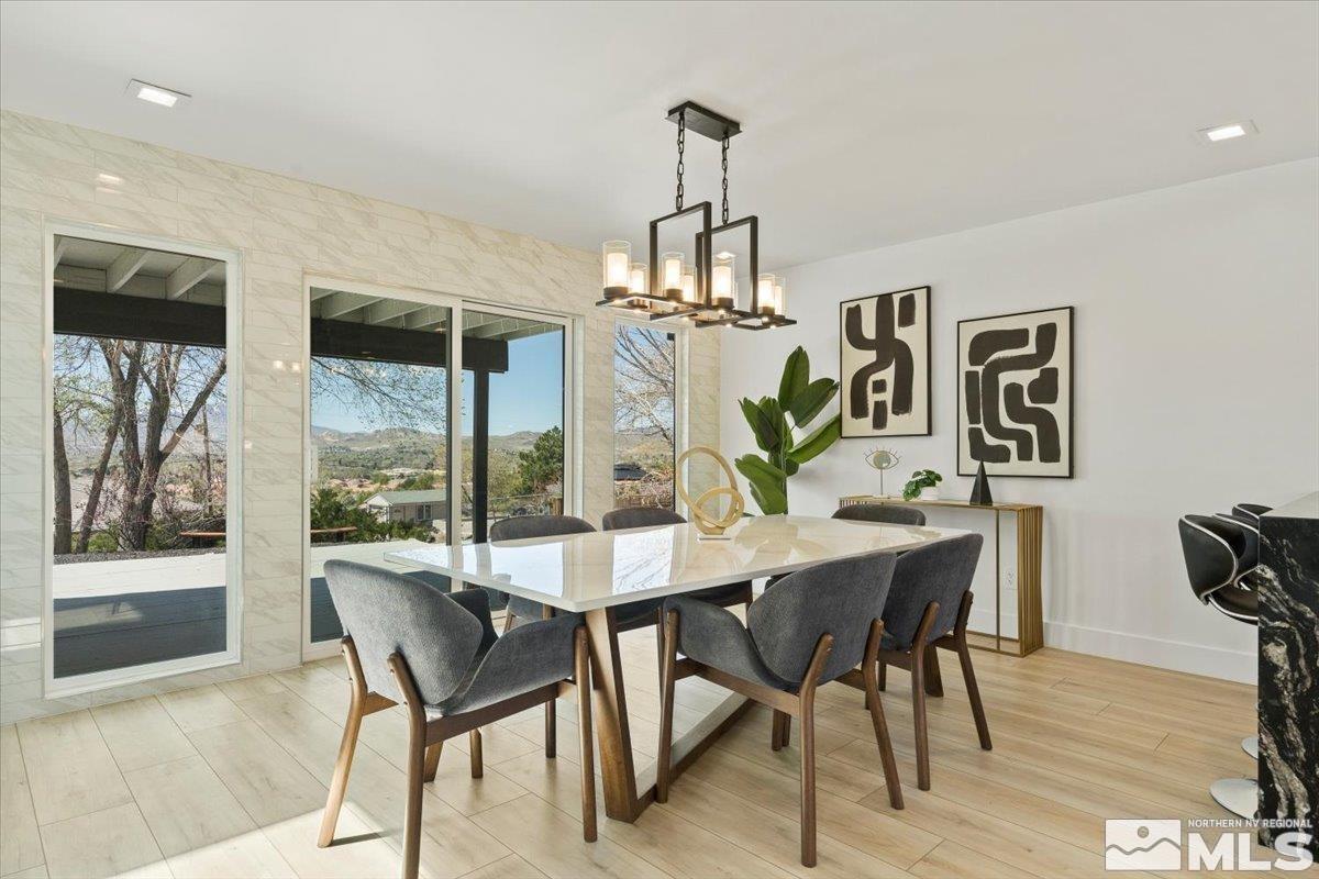 2665 Westview Boulevard Sparks, NV 89434 - Photo 11 of 33 a view of a dining room with furniture window and wooden floor