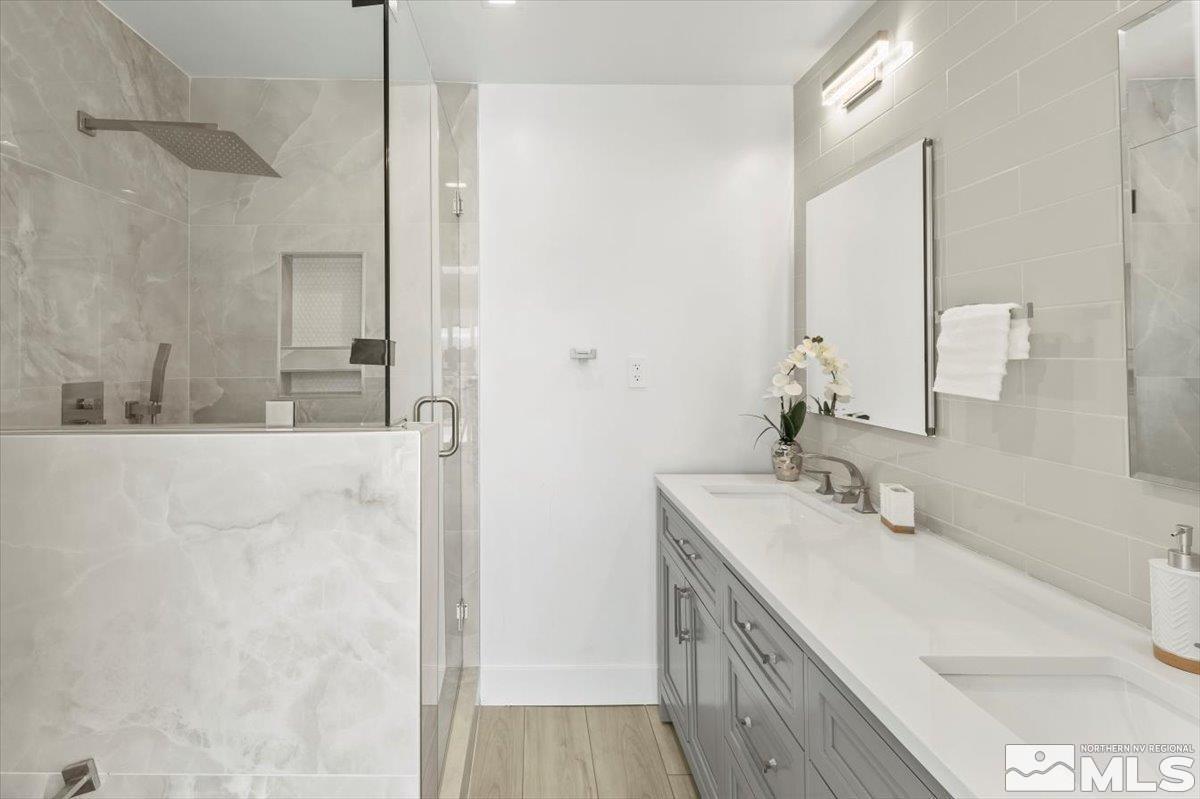 2665 Westview Boulevard Sparks, NV 89434 - Photo 26 of 33 a bathroom with a sink and a mirror