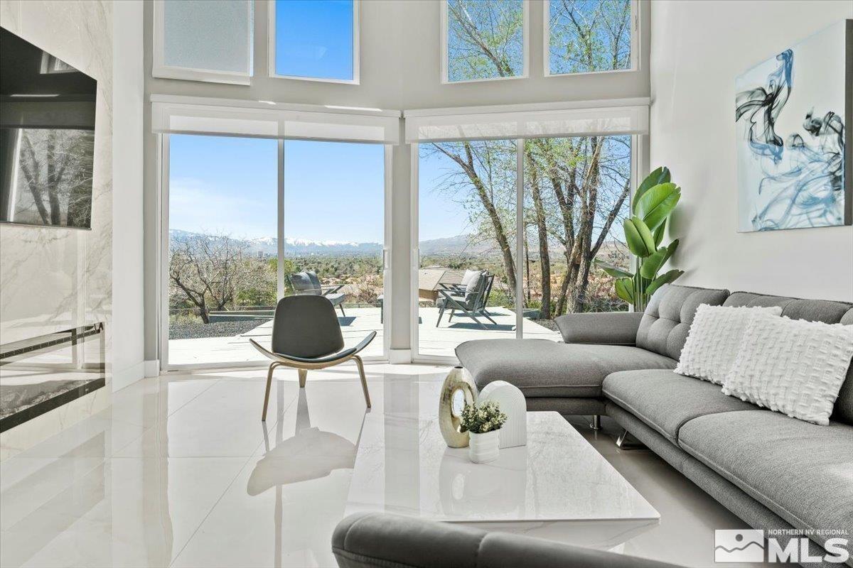 2665 Westview Boulevard Sparks, NV 89434 - Photo 3 of 33 a living room with furniture and a large window